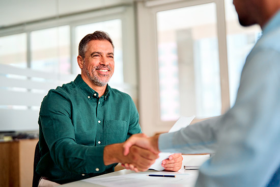 Man shaking hand with contractor